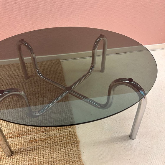Image 1 of Curved tubular chrome coffee table with round glass top