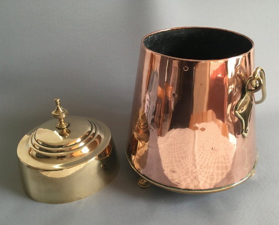 Image 1 of Red copper extinguishing pot with yellow copper lid and handle