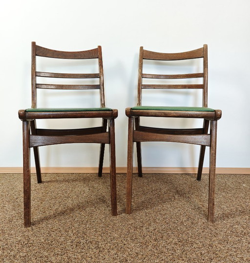 Vintage Paar Esszimmerstühle aus Holz mit grünem Leder / flippige Esszimmerstühle / Mid Century / hergestellt in Jugoslawien