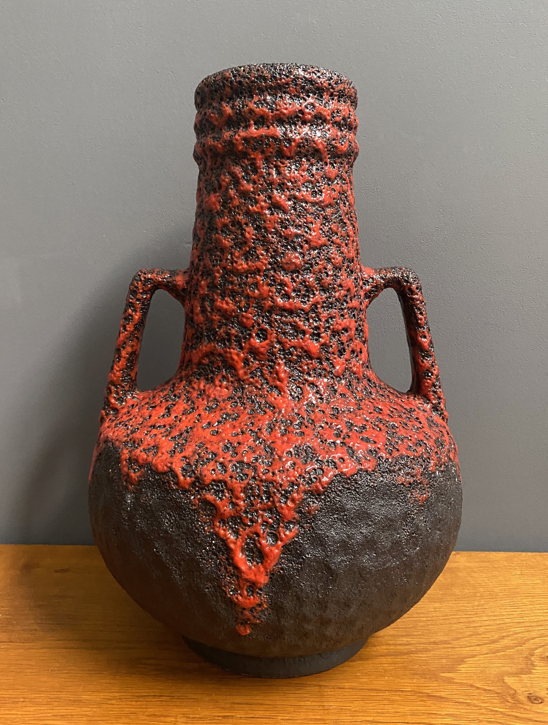 Fat Lava Vase in Red and Black West Germany Ceramics | €80 | Whoppah