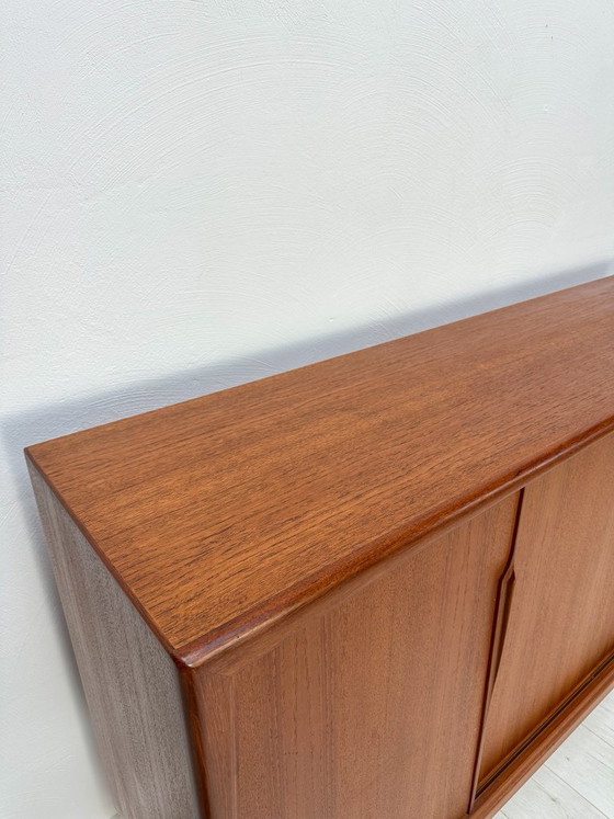 Image 1 of Dänisches Teak-Highboard aus den 1960er Jahren von Axel Christensen für ACO Møbler – Mid-Century-Schrank mit Schiebetüren