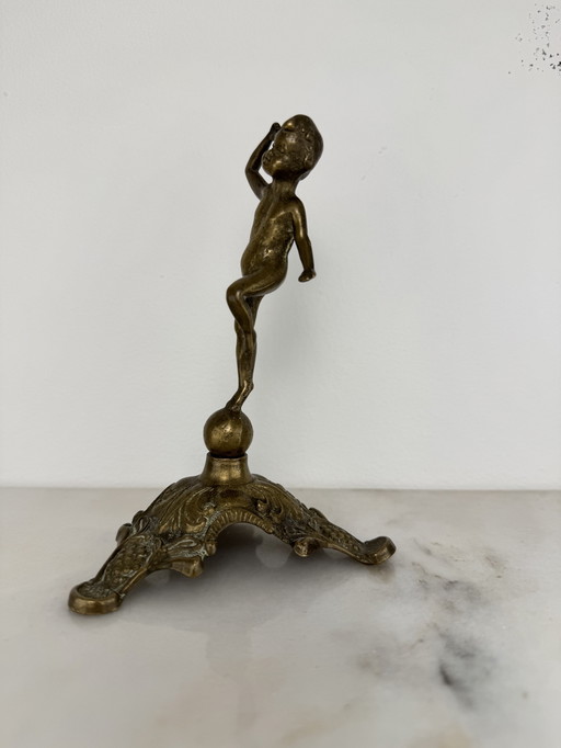Antique bronze figurine of playing child - decorative and rare