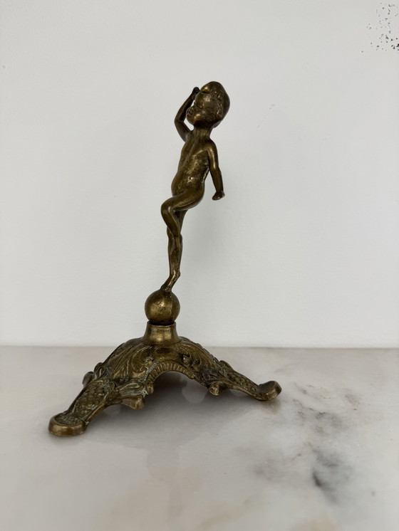 Image 1 of Antique bronze figurine of playing child - decorative and rare