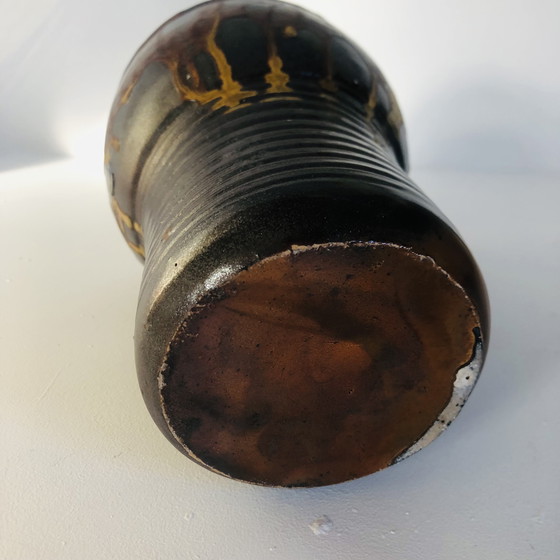 Image 1 of Vaso a torso in ceramica smaltata metallizzata