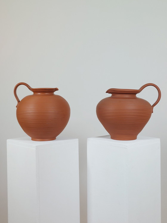 Image 1 of Pair of handmade vintage terracotta handled vases