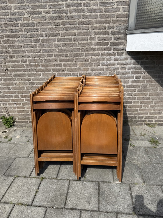 Image 1 of Partij van 37x vintage hardhouten klapstoel ‘70