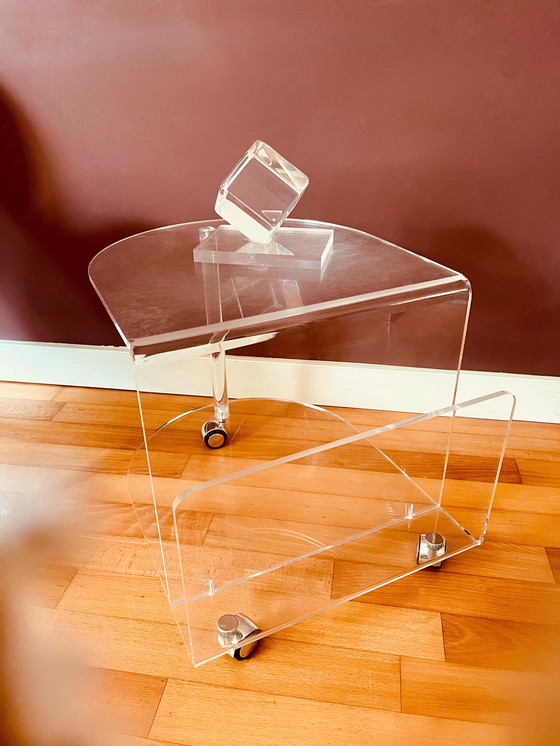 Image 1 of 80's Acrylic side table on wheels + reading material