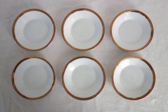 Image 1 of 6 tazas y platillos de Limoges, obra de Robert Haviland, mediados del siglo XX.