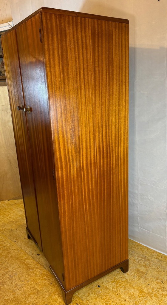 Image 1 of Mid Century Retro Teak Wardrobe by McIntosh (Circa 1960)  A stylish mid century modern teak wardrobe by the renowned British fur