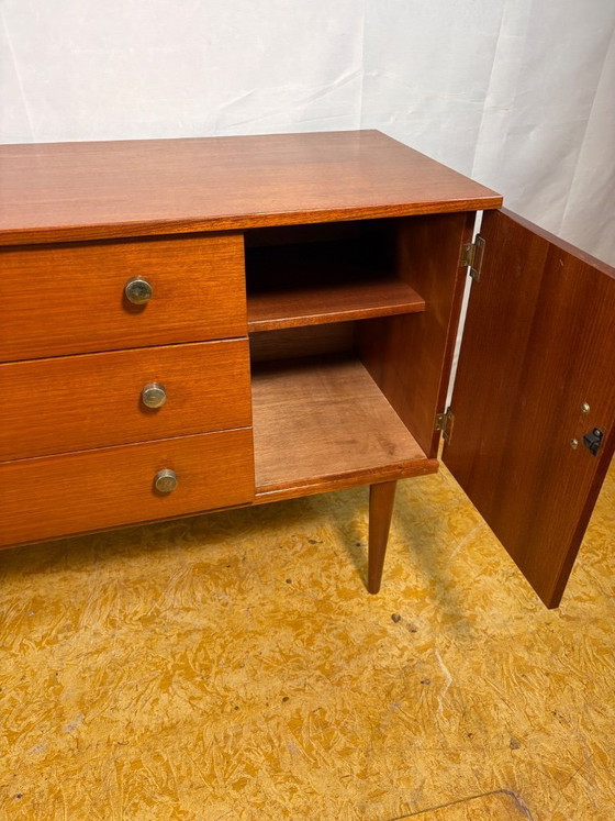 Image 1 of Mid Century Retro Teak Small Sideboard by Schreiber (Circa 1960)  A stylish and compact mid century modern teak sideboard by Sch