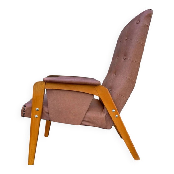 Vintage armchair in light brown faux leather, 1960s. – Wood (photo 2 of 10)