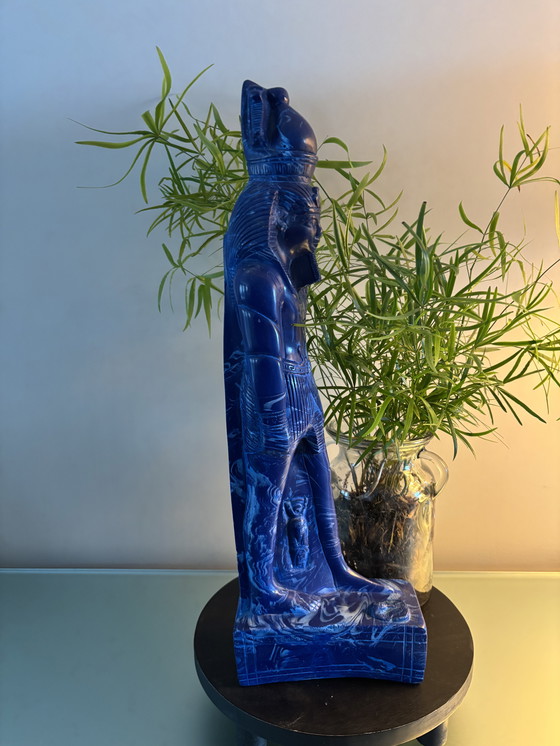 Image 1 of statue of the Egyptian god Thoth.