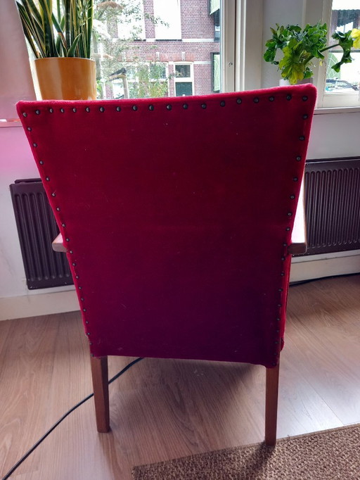 2 red retro chairs