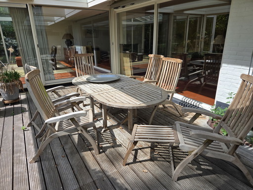 Set da giardino in teak con 6 sedie regolabili.