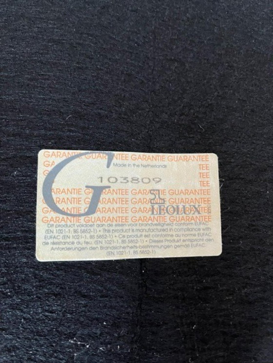 Image 1 of Fauteuil Leolux en cuir rouge avec repose-pieds