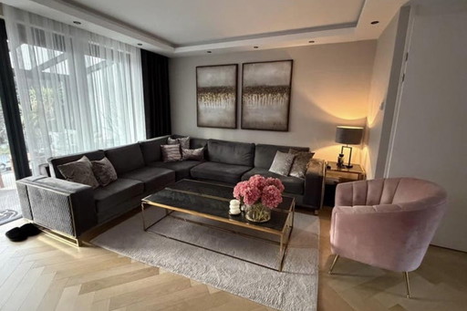 Luxe velvet hoekbank antraciet met gouden details