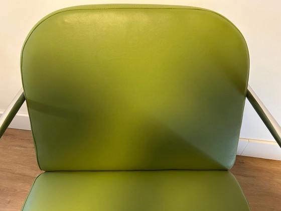 Image 1 of Fauteuil à bascule vintage en cuir vert à structure tubulaire 2x