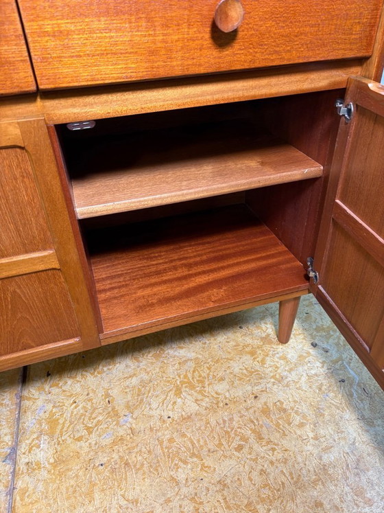 Image 1 of Een zeer gewild teakhouten dressoir in mid-century modern stijl van Nathan, circa 1960-1970.