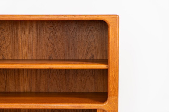 Image 1 of Bookcase in teak by Svend Dyrlund with tambour doors (Denmark, 1960s).
