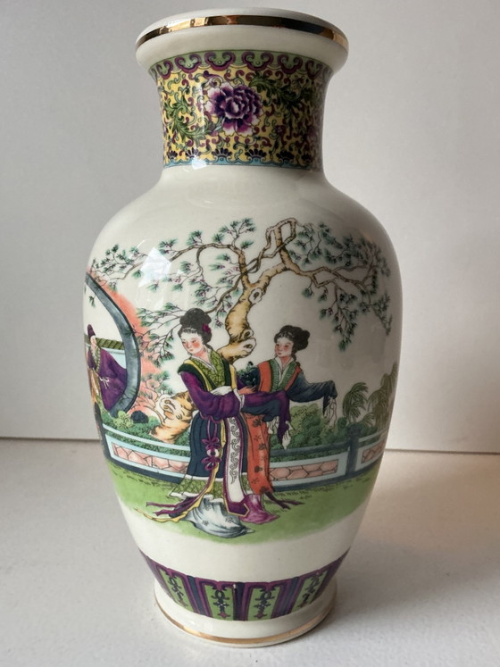 Image 1 of Porcelain vase decorated with a garden scene and figures