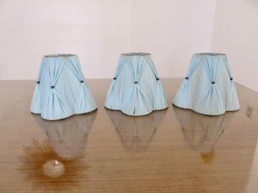 Set of 3 lampshades made of pale blue plastic strips. 1950