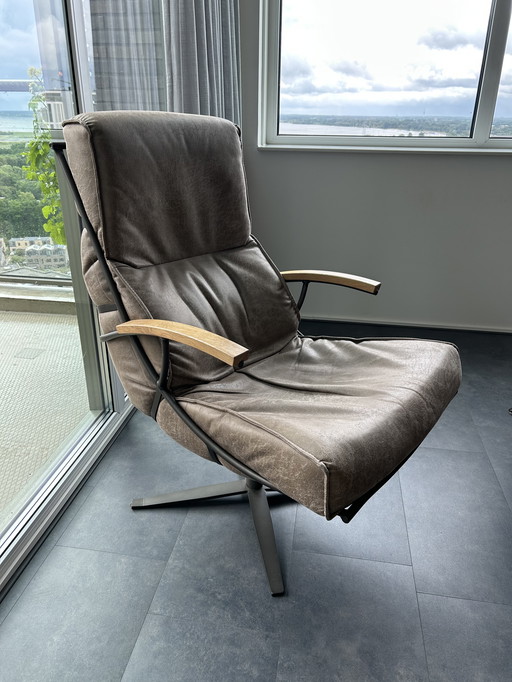 Leather swivel armchair