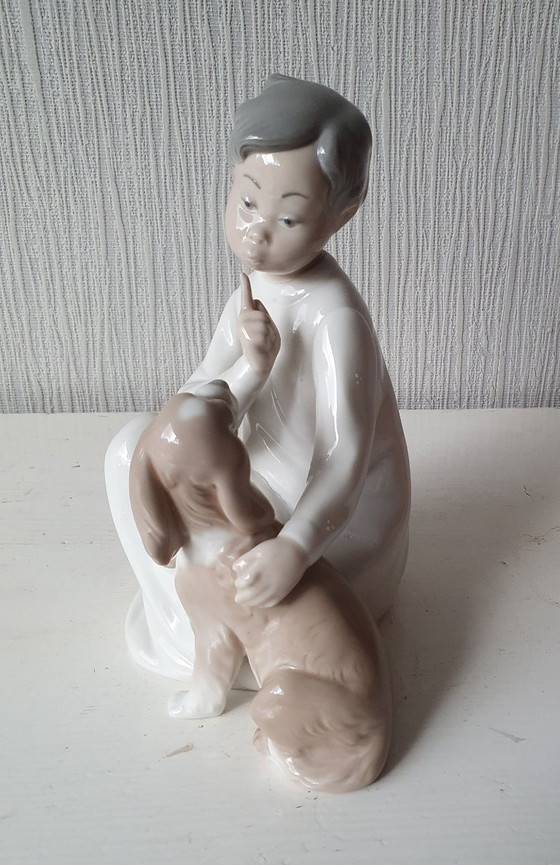 Image 1 of Authentic Lladro "Boy with dog" - porcelain figurine 20 cm