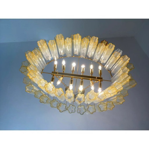 Luxe ovale Tronchi kroonluchter van helder en amberkleurig Murano-glas.