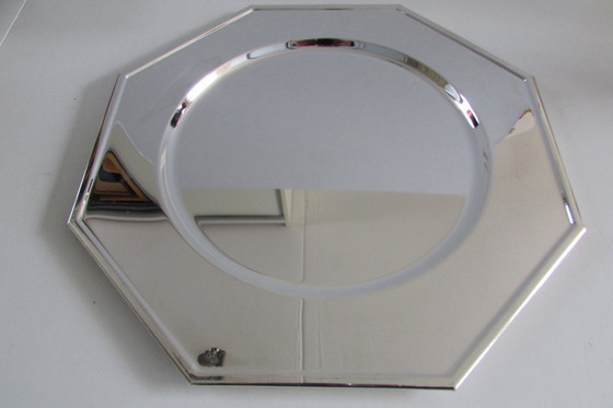 Image 1 of Dos platos base plateados en su embalaje original.