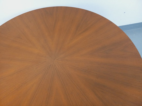 Image 1 of Grande table basse ronde style scandinave vintage modulable en table à manger “monte et baisse”, en teck et métal noir