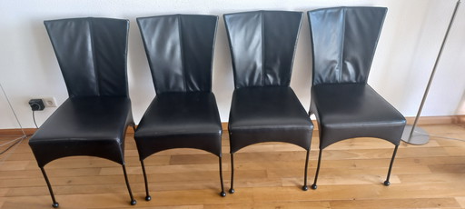 4 comfortable leather dining chairs