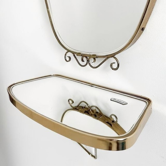 Image 1 of Vintage mid-century DeKnudt wandspiegel en wandconsole messing asymmetrisch acanthus 1960's