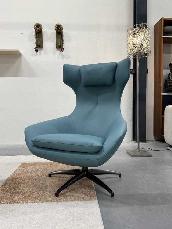 Image 1 of Poltrona Leolux Caruzzo plus con poggiapiedi in pelle blu