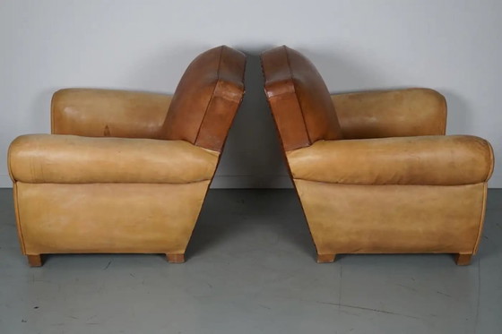 Image 1 of Coppia di poltrone da club francesi in pelle color cognac con schienali a baffo, anni '40