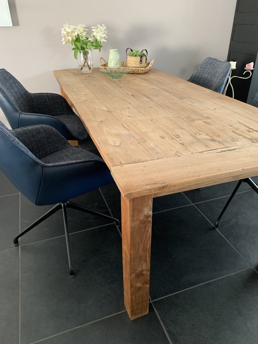 Solid table made of old teak.
