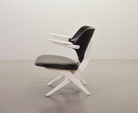 Image 1 of Louis van Teeffelen Dutch Design Pelican Arm Chair for Webe in Solid White Painted Teakwood and Black Leatherette. 