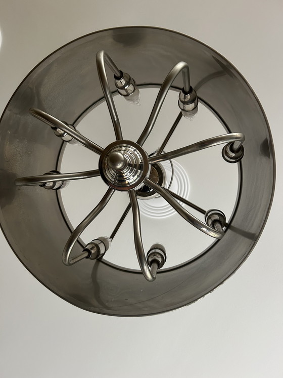 Image 1 of Lampada a sospensione con paralume cilindrico color argento e catena dimmerabile.