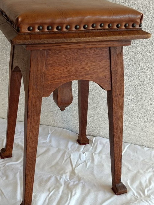 Antiker verstellbarer Klavierstuhl. Amsterdam Schule