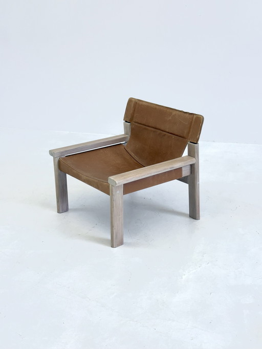 Fauteuil vintage en cuir de selle couleur cognac