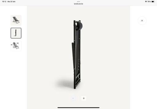 2 black folding lounge chairs