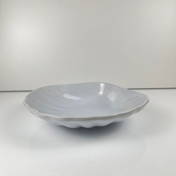 Image 1 of Large platter in the shape of a scallop shell, Emile Henry, France, mid-20th century