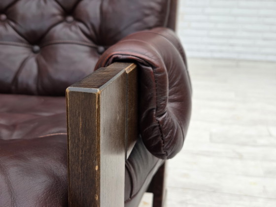 Image 1 of 1970, Scandinavische fauteuil met hoge rugleuning, bruin meubelleder, donker beukenhout.