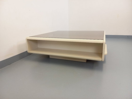 Image 1 of Vintage square coffee table in Space Age style, made of white wood and smoked glass, from the 1970s