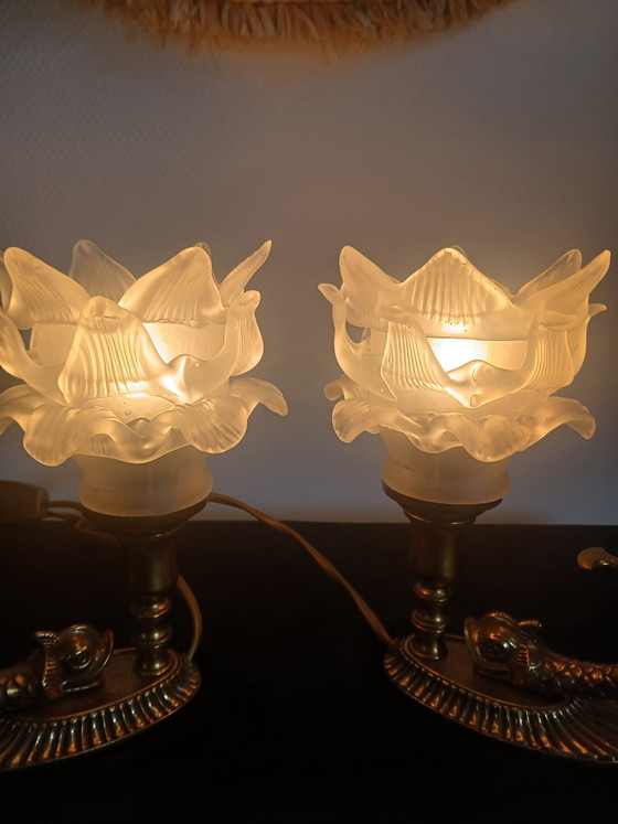 Image 1 of Pair of tulip-shaped dolphin lamps.