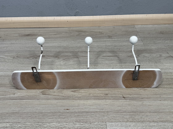 Image 1 of Mid - Century coat rack sleek and timeless design