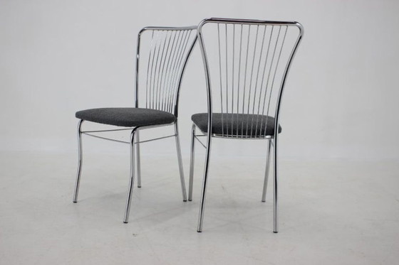 Image 1 of Set van zes Italiaanse eetkamerstoelen van chroom en bouclé, jaren 70.