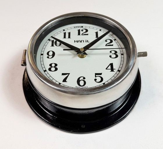 Image 1 of Vintage zwarte Hanil scheepswandklok, jaren 80