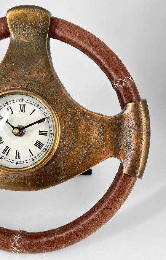 Image 1 of Sculptural steering wheel table clock made of patinated metal – Vintage Automobilia