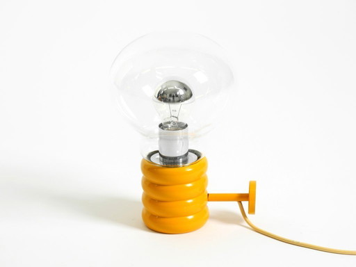 Very rare original 1960s Space Age "Bulb" wall lamp by Ingo Maurer in yellow with a clear glass shade