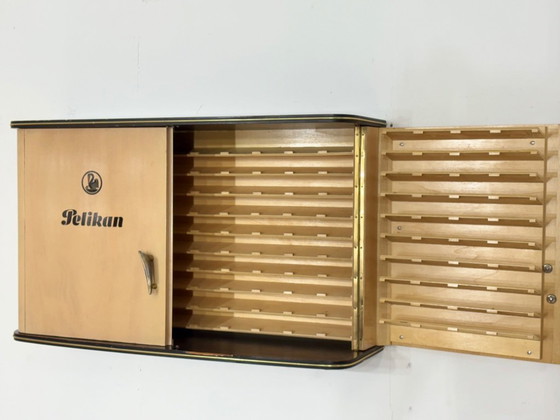 Image 1 of Beautiful vintage Pelikan wall cabinet, wall cupboard, hanging display cabinet, mid-century modern